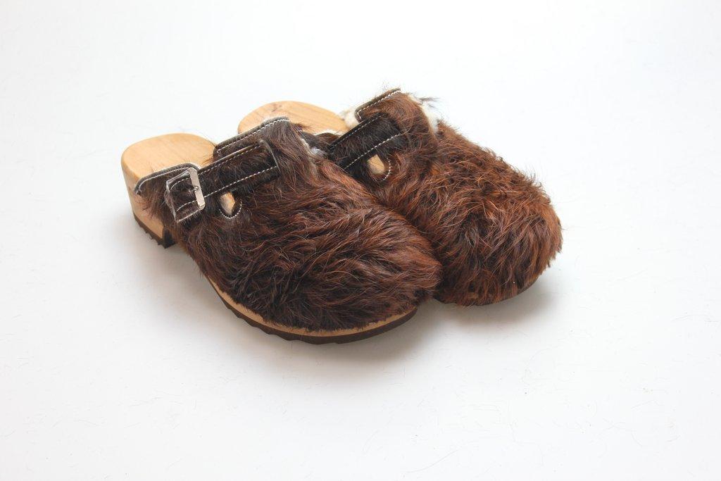 Clogs mit Absatz in Fell gefüttert