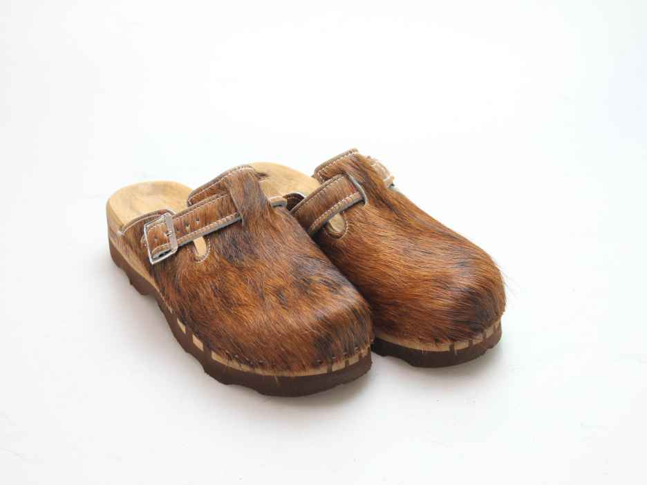 Bewegliche Clogs für Herren in Fell