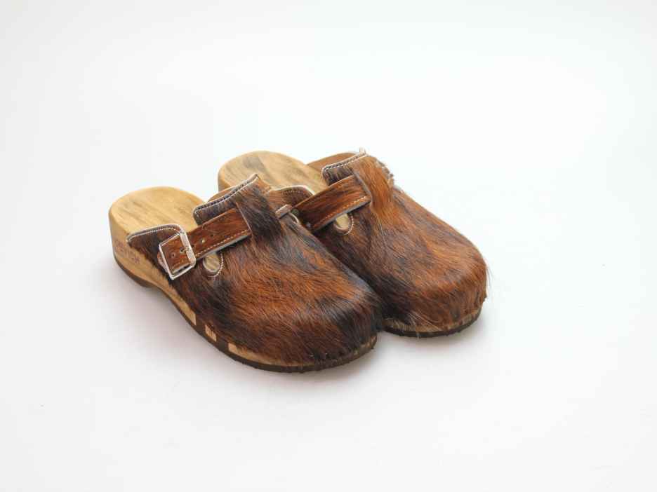 Bewegliche Clogs für Damen in Fell