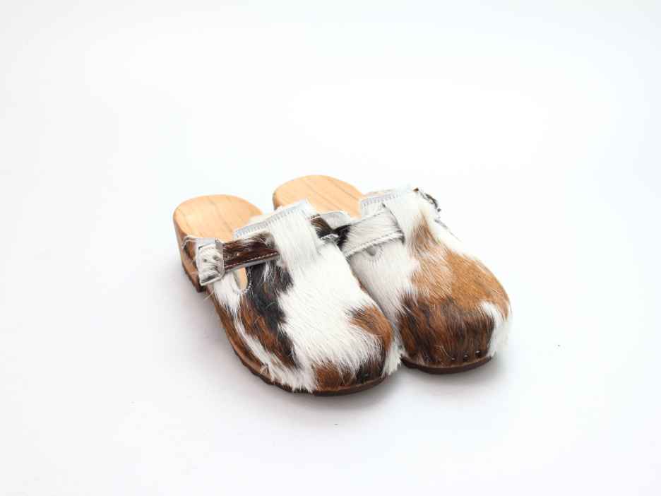 Clogs mit Absatz in Fell gefüttert