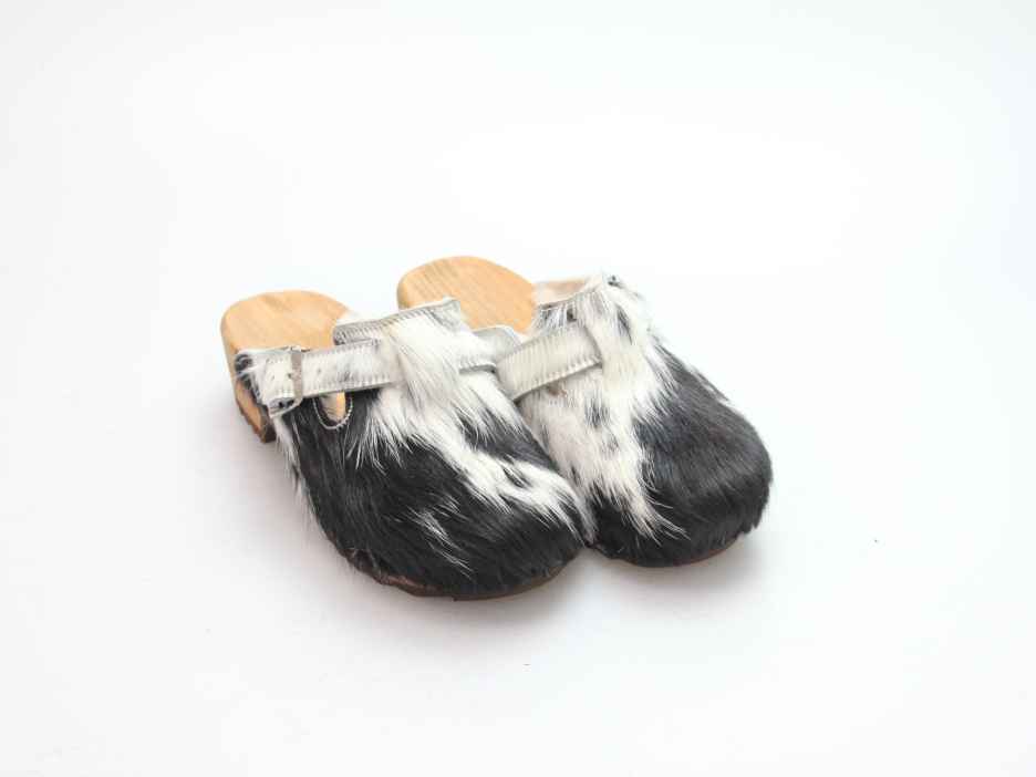 Clogs mit Absatz in Fell gefüttert