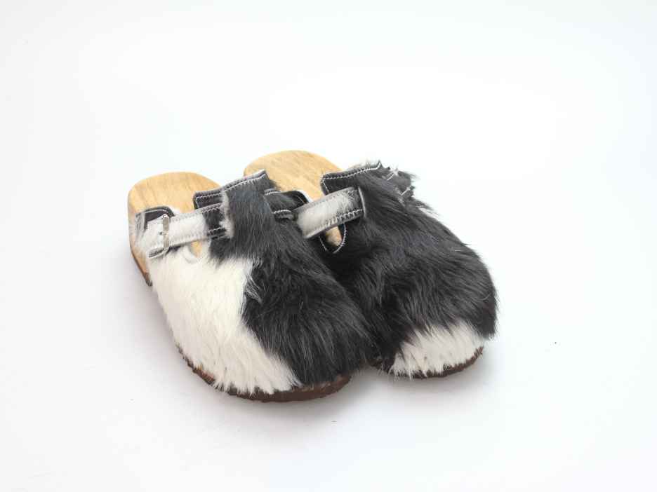 Clogs mit Absatz in Fell gefüttert