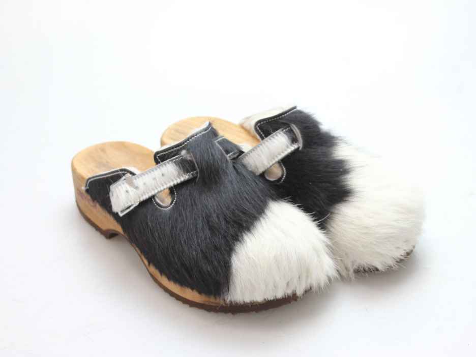 Clogs mit Absatz in Fell gefüttert
