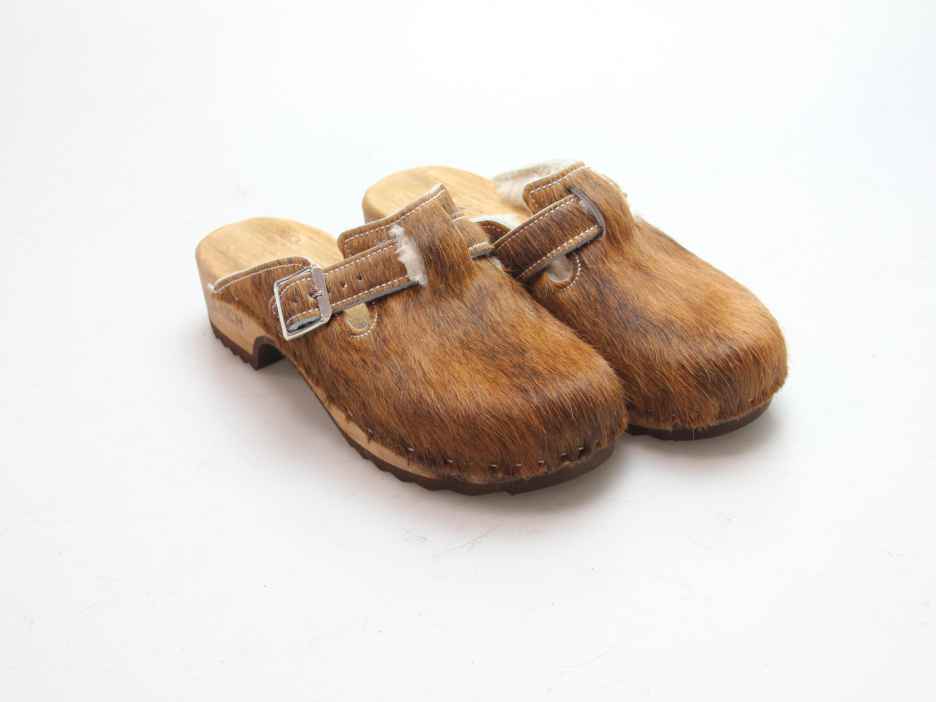 Clogs mit Absatz in Fell gefüttert