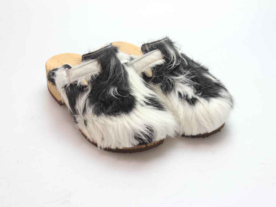 Clogs mit Absatz in Fell gefüttert